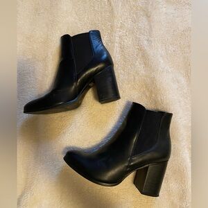 Pointed toe black booties